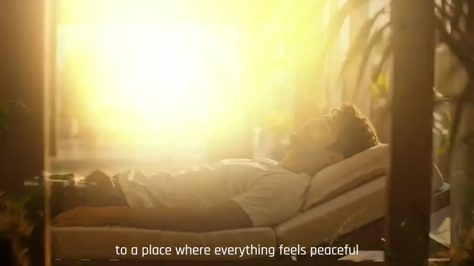 A man resting in warm morning light