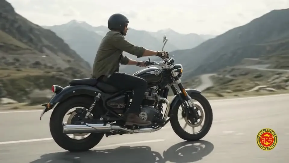 A rider on a Royal Enfield on a mountain road